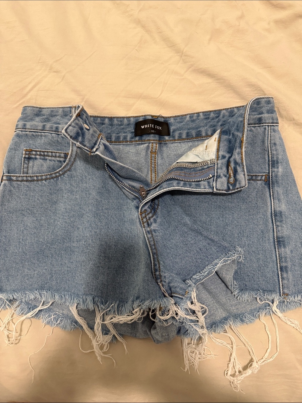 White Fox distressed denim shorts